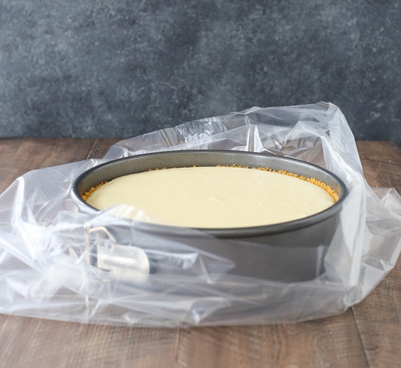Step 5- image of cheesecake in slow cooker liner