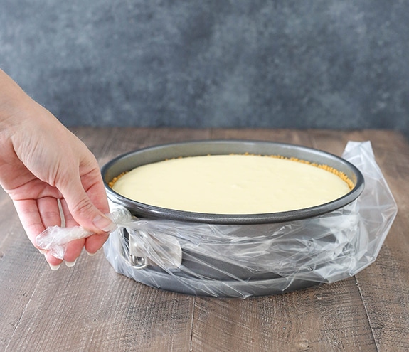 Step 5 - image of securing the slow cooker liner on springform pan