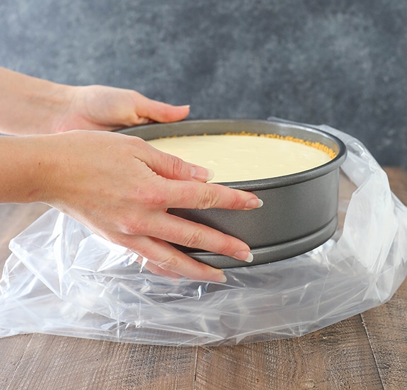 Step 5 - Placing cheesecake into slow cooker liner