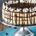 Side view of a Mocha Chocolate Icebox Cake on a metal cake stand