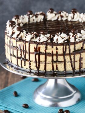 Side view of a Mocha Chocolate Icebox Cake on a metal cake stand