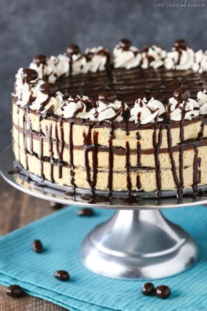 Side view of a Mocha Chocolate Icebox Cake on a metal cake stand