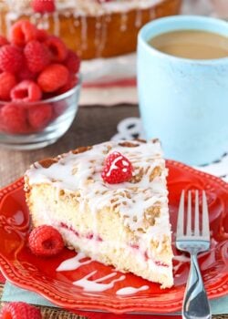 A slice of Raspberry Cream Cheese Coffee Cake on a red plate