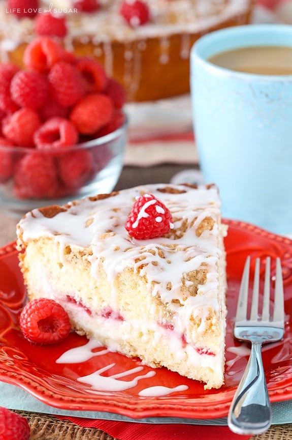 slice of Raspberry Cream Cheese Coffee Cake on red plate