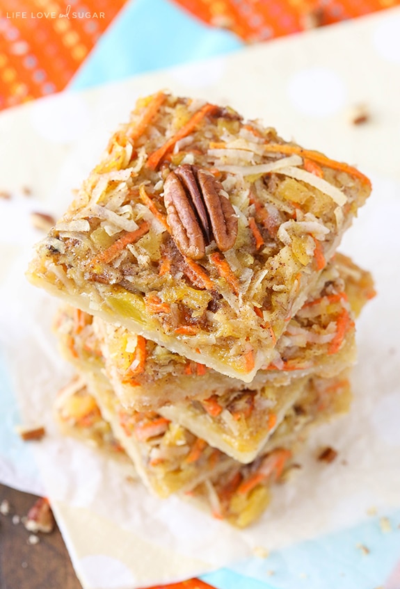 Overhead view of Carrot Cake Shortbread Bars stacked on a napkin