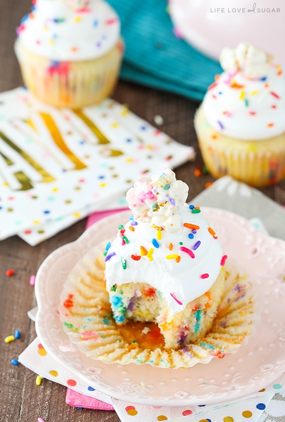 Funfetti Popcorn Marshmallow Treat Cupcake with a bite taken out