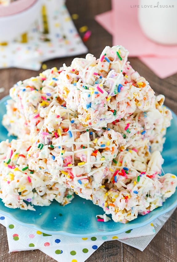 Funfetti Marshmallow Popcorn Treats on blue plate