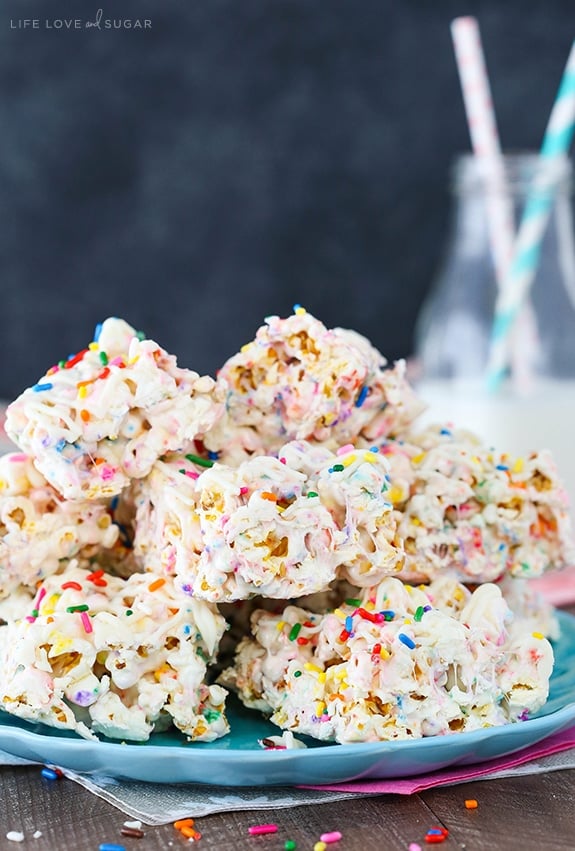 Funfetti Marshmallow Popcorn Treats stacked on plate