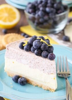 Slice of Lemon Blueberry Mousse cake on a blue plate