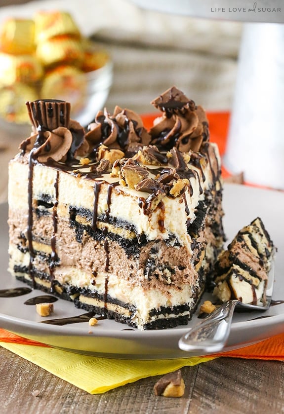 Reeses Peanut Butter Chocolate Icebox Cake slice on a plate with a bite on fork