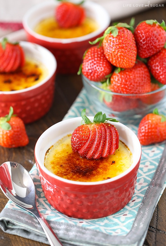 Strawberries Brûlée in red ramekins
