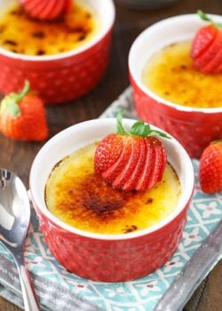 overhead view of Strawberries Brûlée in red ramekins