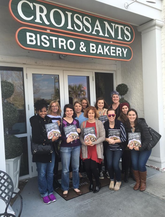 group of bloggers posing outside Croissants bistro and bakery