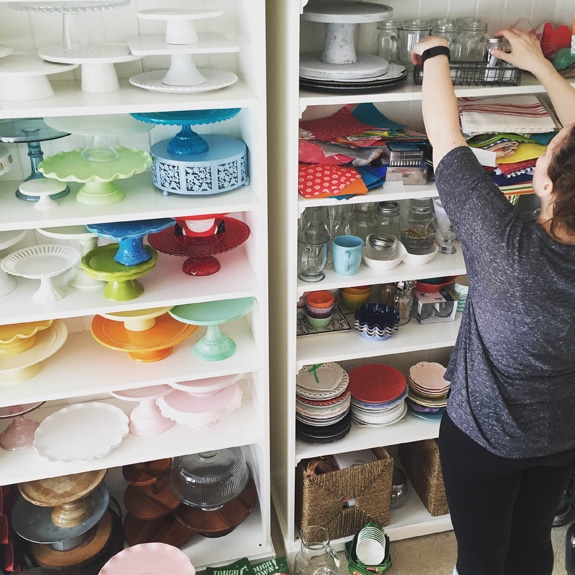 organizing shelves of photography props