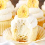 Close-up of a Banana Cream Pie Cupcake with a bite out of it