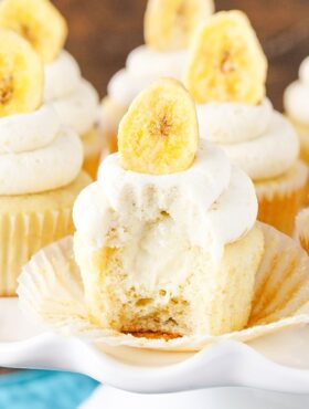 Close-up of a Banana Cream Pie Cupcake with a bite out of it