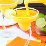 image of Mango Margaritas being poured into a glass