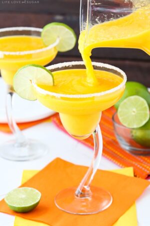 image of Mango Margaritas being poured into a glass