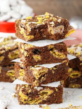 stack of Muddy Buddy Brownies with bite taken out