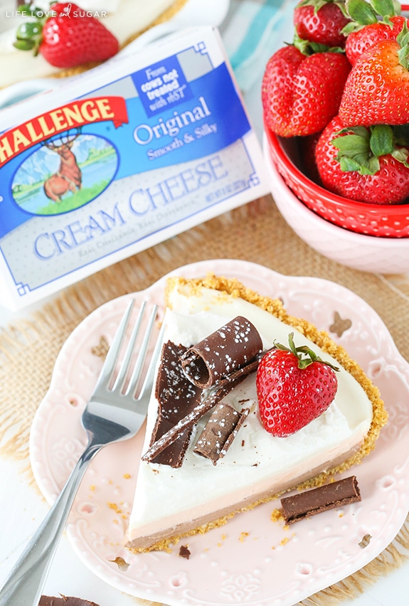 Overhead view of No Bake Neapolitan Cheesecake Pie slice with chocolate curls