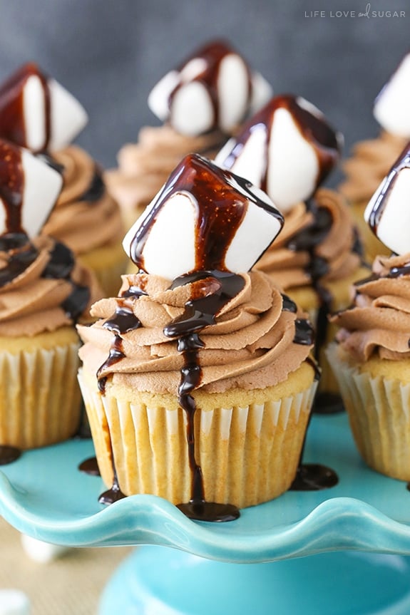 Close-up of Nutella Peanut Butter Fluffernutter Cupcakes on a blue stand