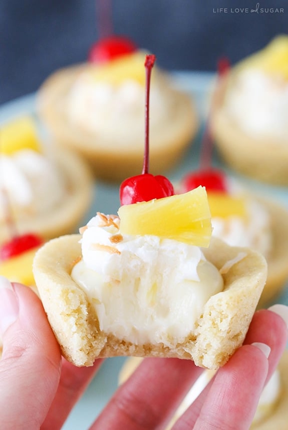 Close-up of a Pina Colada Cookie Cup with a bite removed