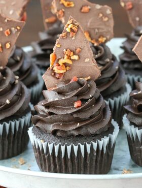 close up of Smokey Bourbon Chocolate Cupcakes with Bacon