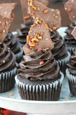 close up of Smokey Bourbon Chocolate Cupcakes with Bacon