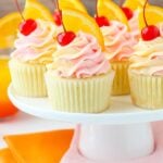 Tequila Sunrise Cupcakes on cake stand