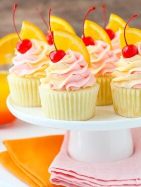 Tequila Sunrise Cupcakes on cake stand