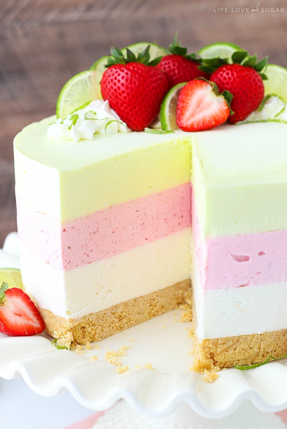 Key Lime Strawberry Coconut Ice Cream Cake with a slice removed