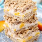 A Stack of Peach Cinnamon Oatmeal Cheesecake Bars