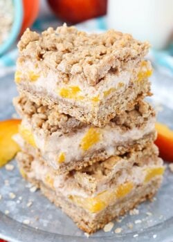 A Stack of Peach Cinnamon Oatmeal Cheesecake Bars