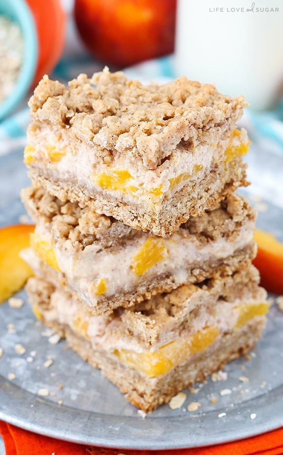 A Stack of Peach Cinnamon Oatmeal Cheesecake Bars