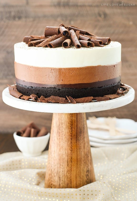 Triple Chocolate Mousse Cake on stand