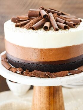 Triple Chocolate Mousse Cake on cake stand