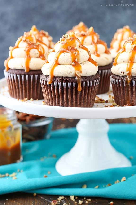 Chocolate Turtle Cupcakes on a cake stand