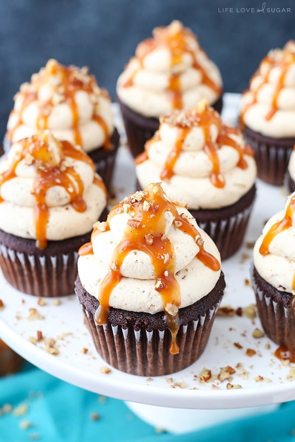 Overhead view of Chocolate Turtle Cupcakes on a cake stand