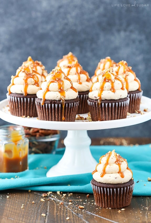 Chocolate Turtle Cupcakes on a cake stand