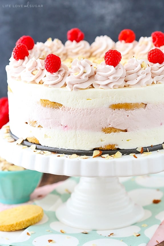 Raspberry Almond Shortbread Icebox Cake on a cake stand