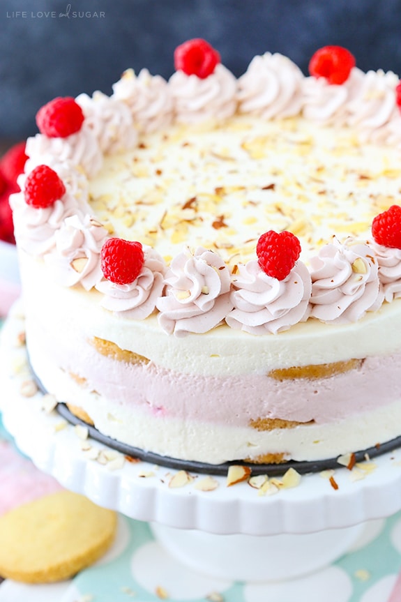 Raspberry Almond Shortbread Icebox Cake on a cake stand