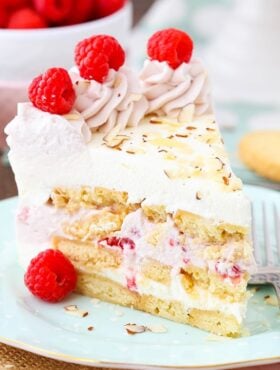 A slice of Raspberry Almond Shortbread Icebox Cake