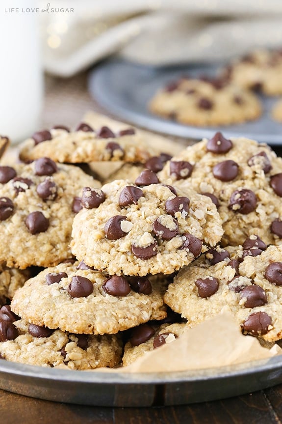 Homemade Oatmeal Chocolate Chip Cookies stacked on a silver platter