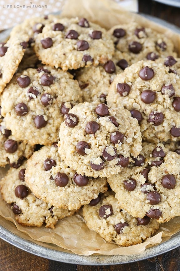 A large platter filled with stacked Oatmeal Chocolate Chip Cookies 