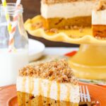 Caramel Pumpkin Spice Blondie Streusel Cheesecake on orange plate