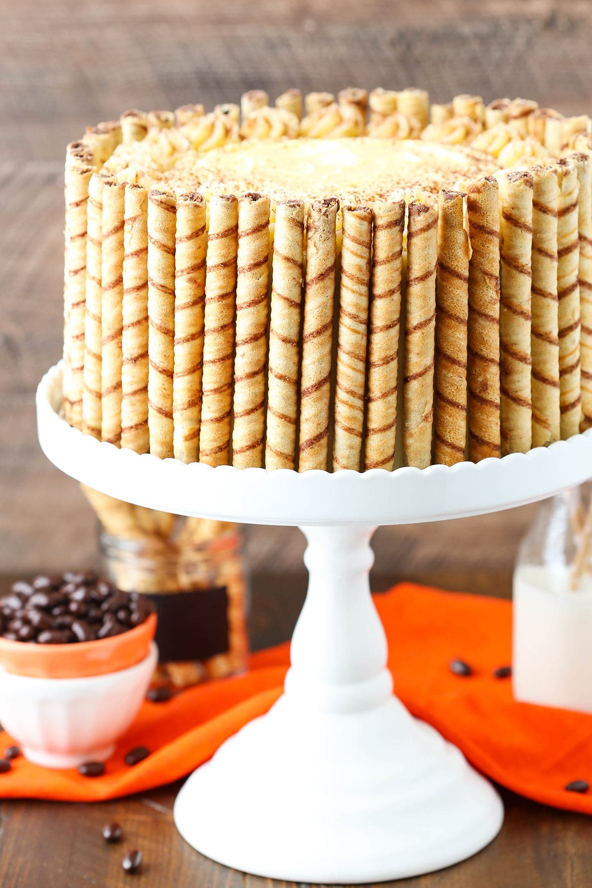 Pumpkin Tiramisu Layer Cake on a cake stand.