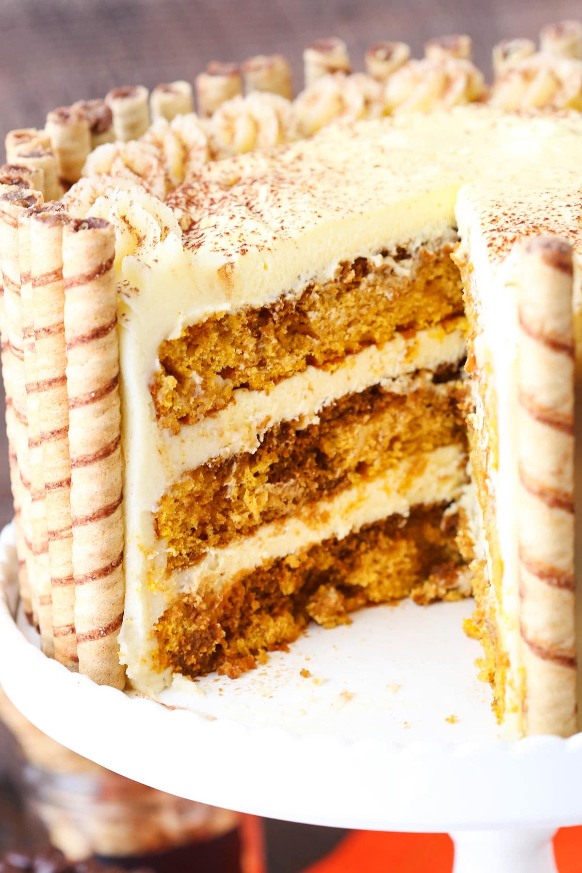 Pumpkin Tiramisu Cake with a slice removed.