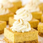Pumpkin Cheesecake Bars in rows on table
