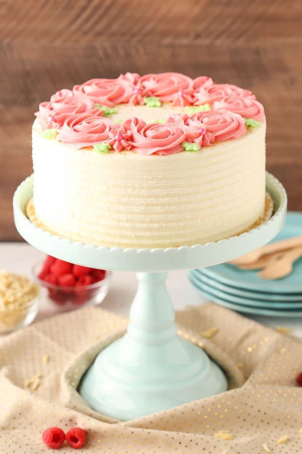 Raspberry Almond Layer Cake! Such a light, moist cake with fresh raspberry frosting!