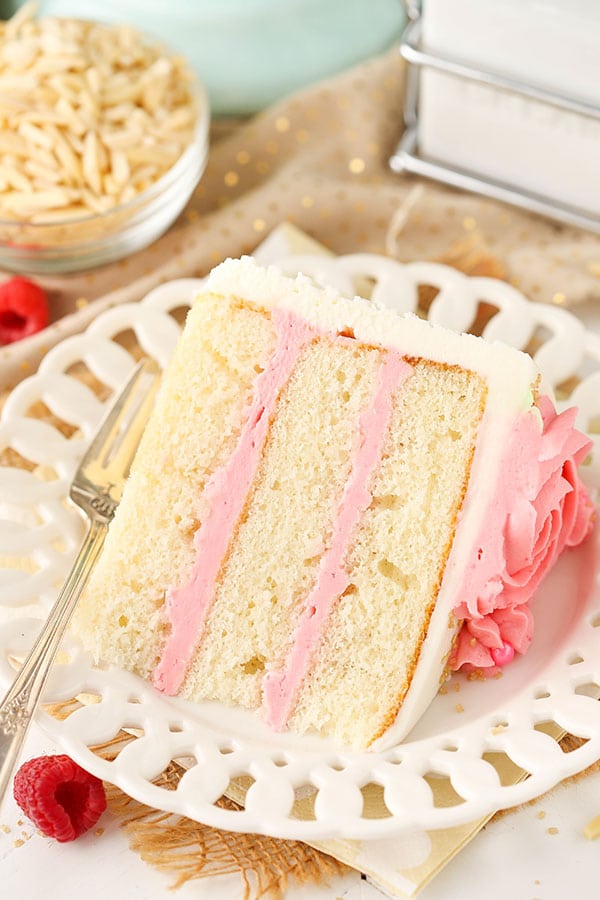 Raspberry Almond Layer Cake! Such a light, moist cake with fresh raspberry frosting!